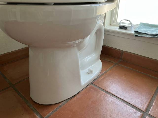 Toilet base and the floor around it